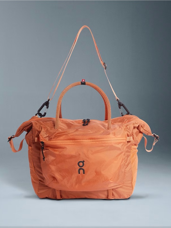 On Running Other - On Running Orange Track Pack 35L Lite